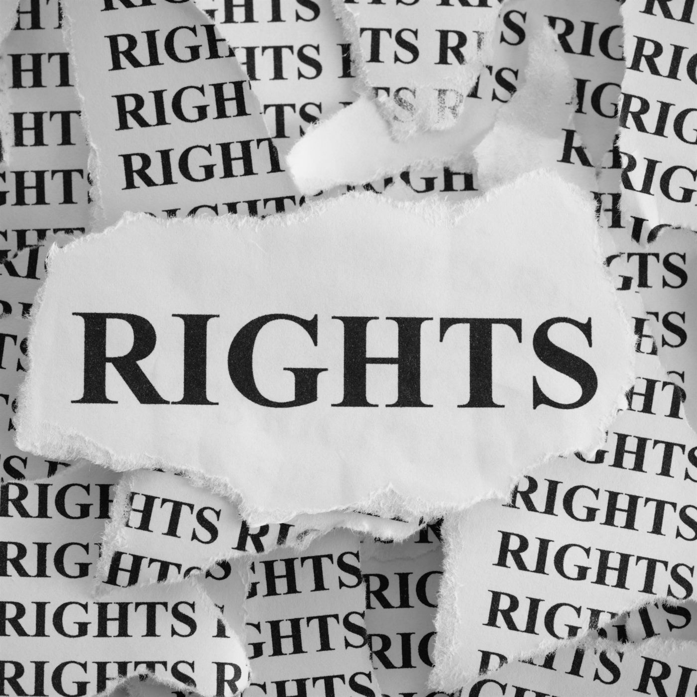 The word “RIGHTS” spelled out with letters cut from newspapers and magazines